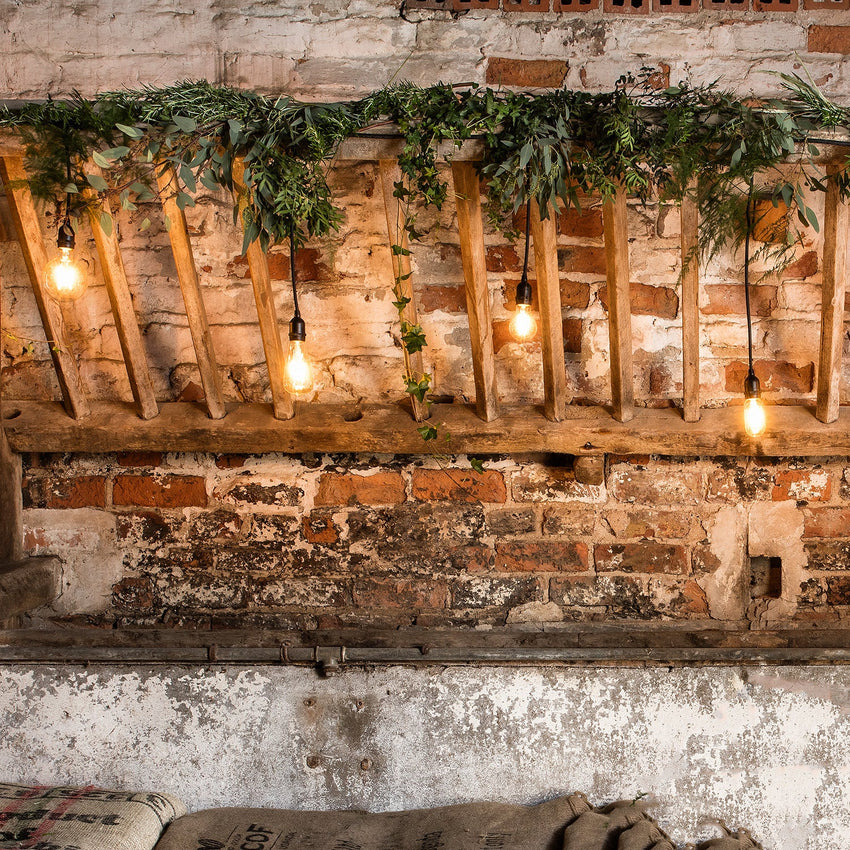 Ingenious connect lighting festoon lights in a barn setting