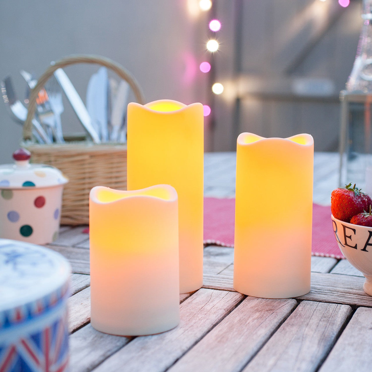 CA13501_3-Outdoor-Battery-Operated-LED-Flickering-Candles-Teak-Table_P3.jpg