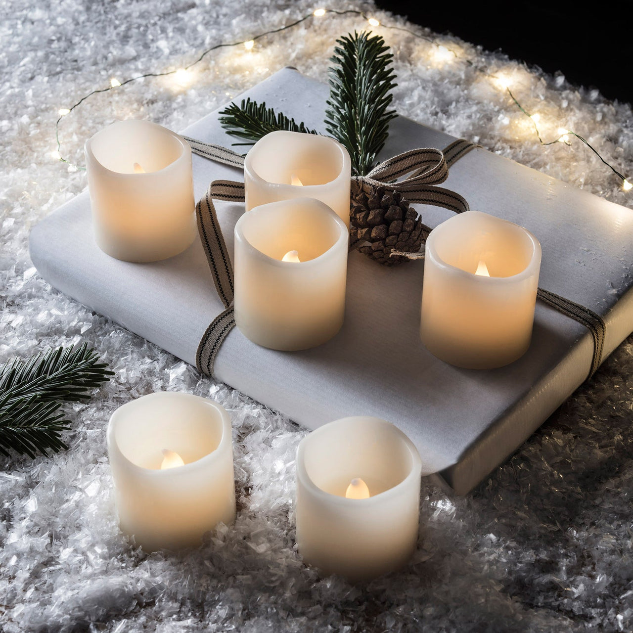 CA13855_6-Wax-Votive-Battery-Candle-Tea-Lights-Christmas-Snow_P1.jpg