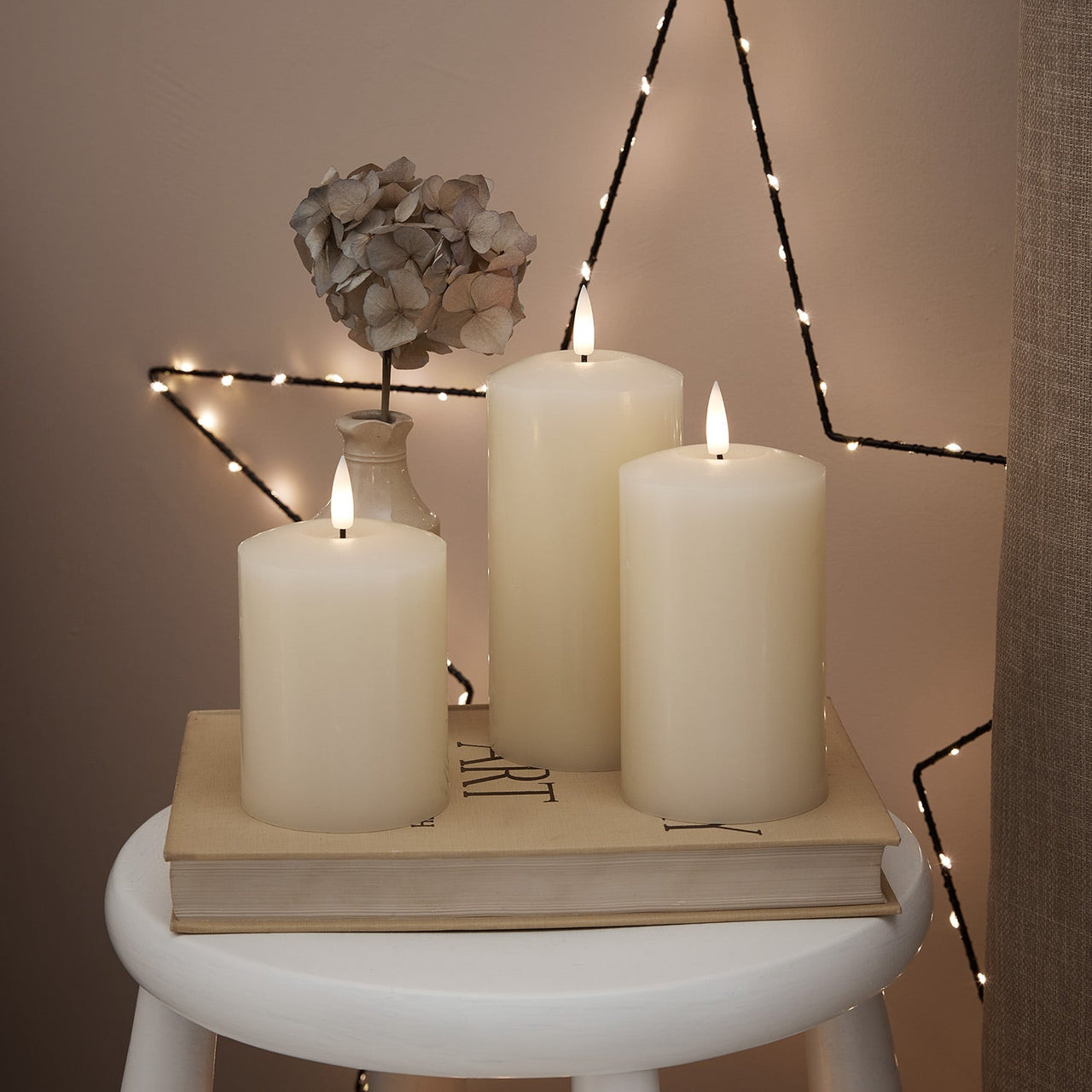 CA18013_truglow-led-pillar-candle-trio--white-stool_1.jpg