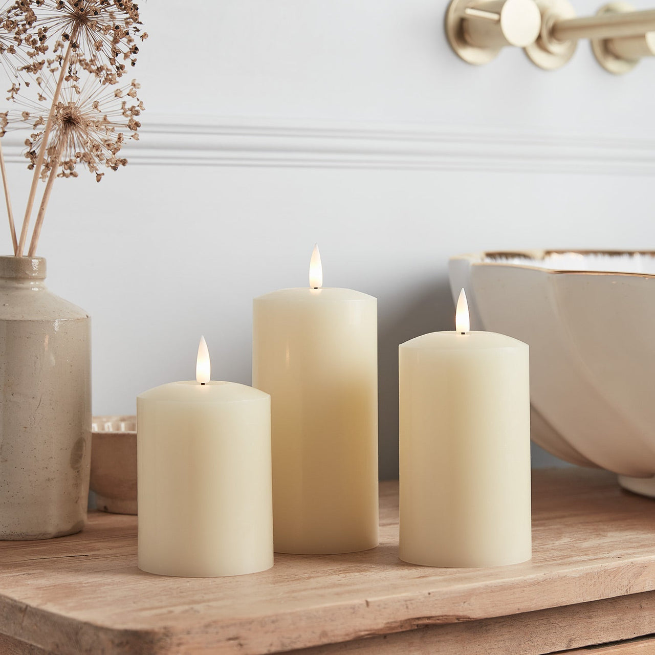 CA18013_truglow-led-pillar-candle-trio-white-sidetable_2.jpg