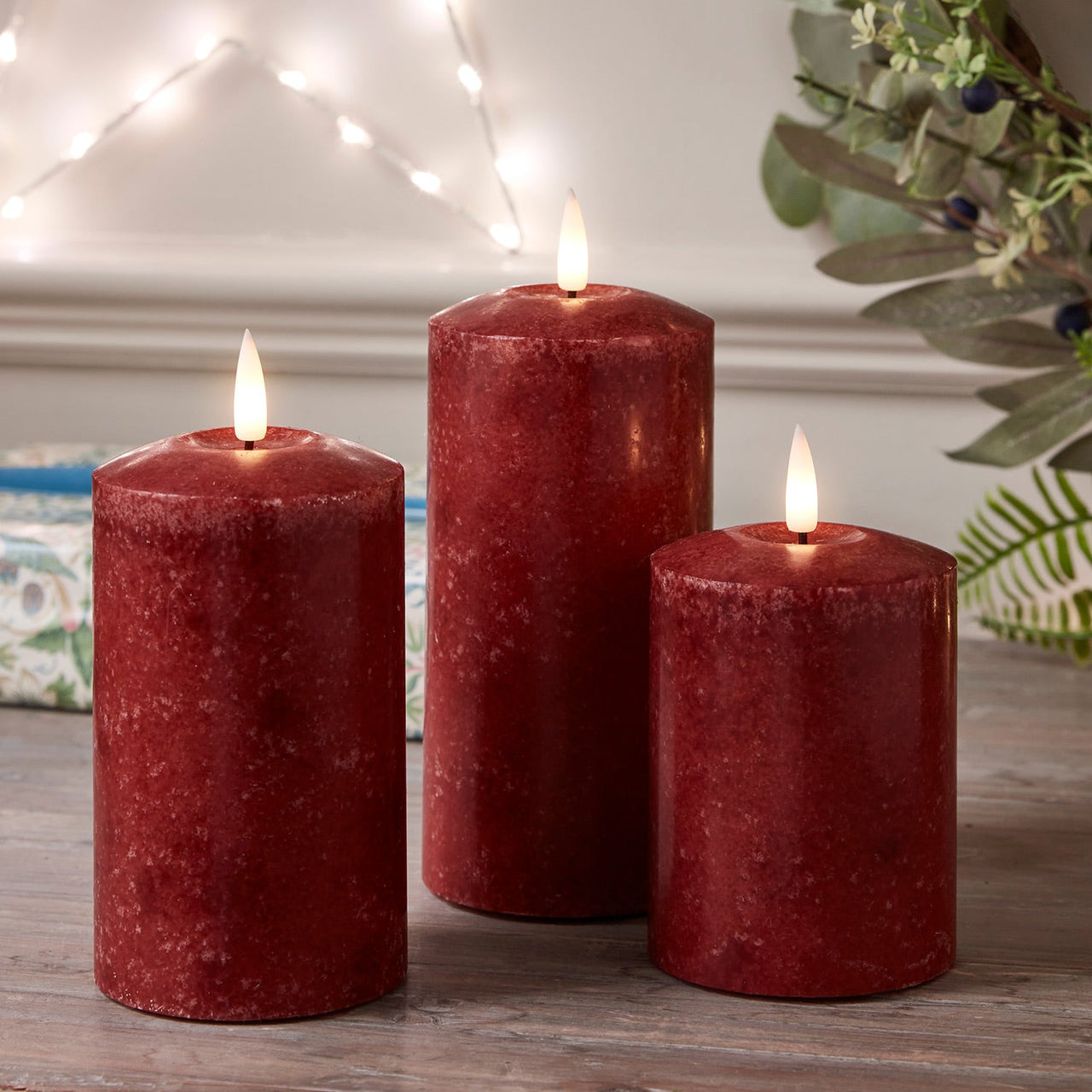 CA21042_TruGlow-Mottled-Red-LED-Pillar-Candle-Trio_2.jpg