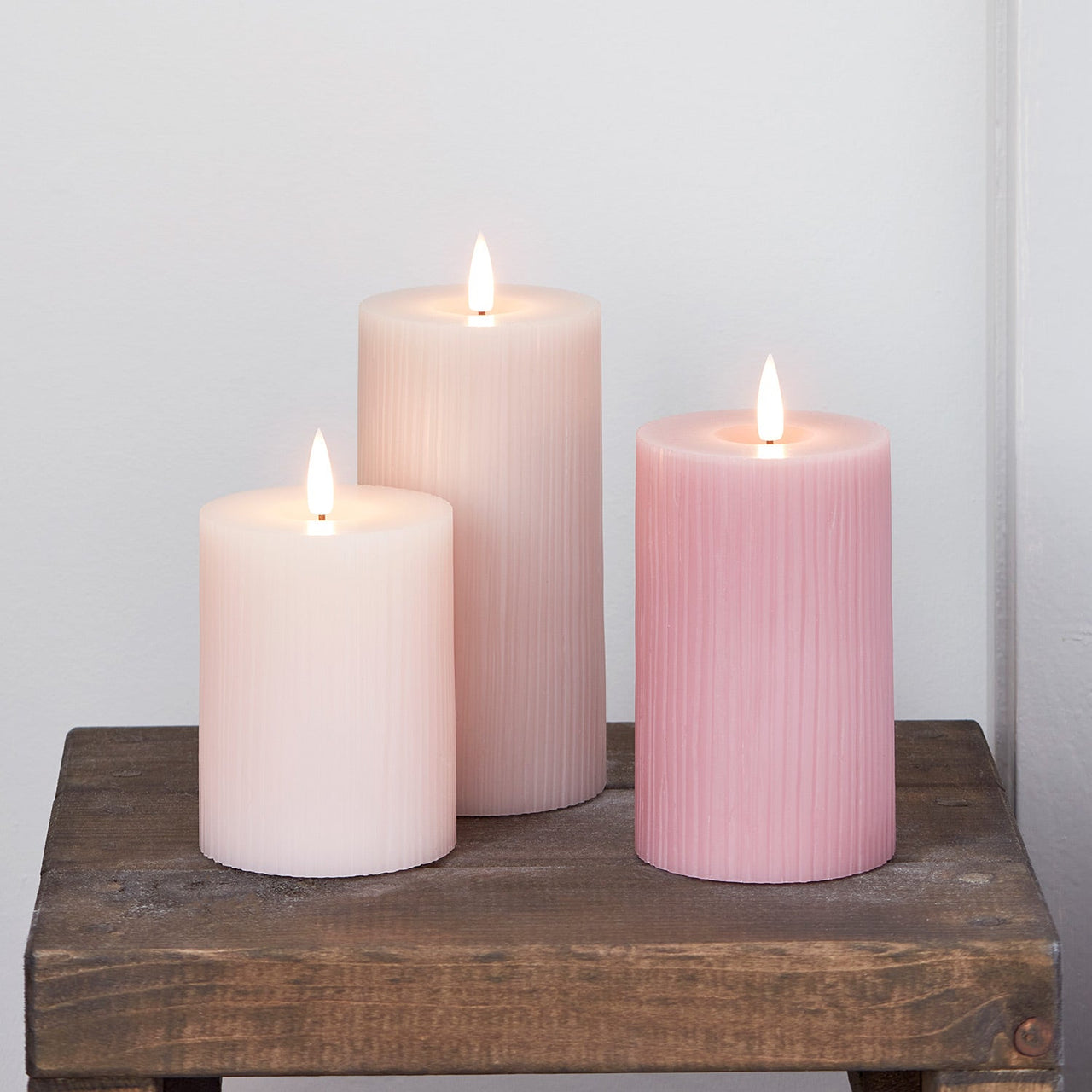 TruGlow® Blush Pink Ribbed LED Pillar Candle Trio