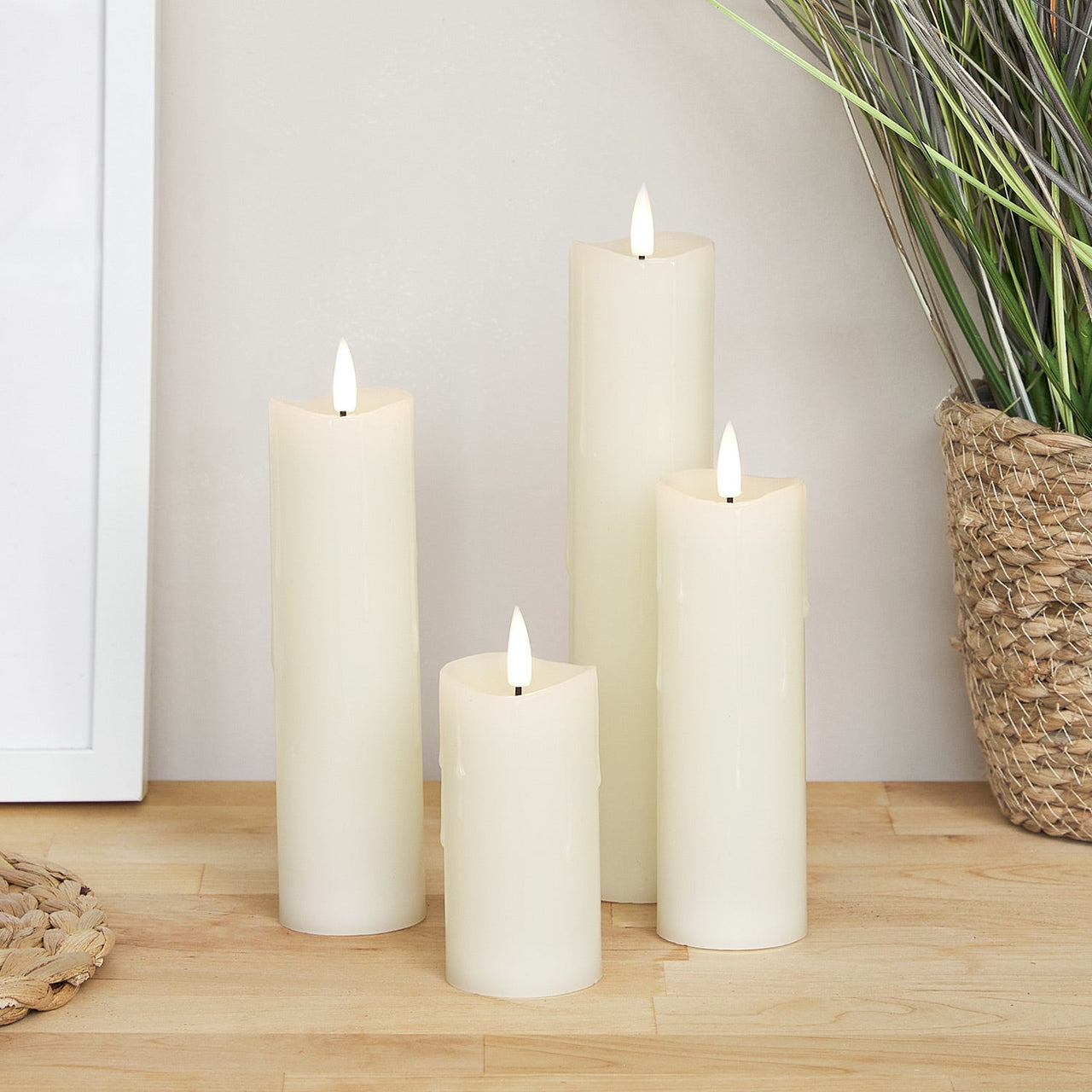 4 Ivory TruGlow® Dripping Wax LED Slim Pillar Candles with Remote Control