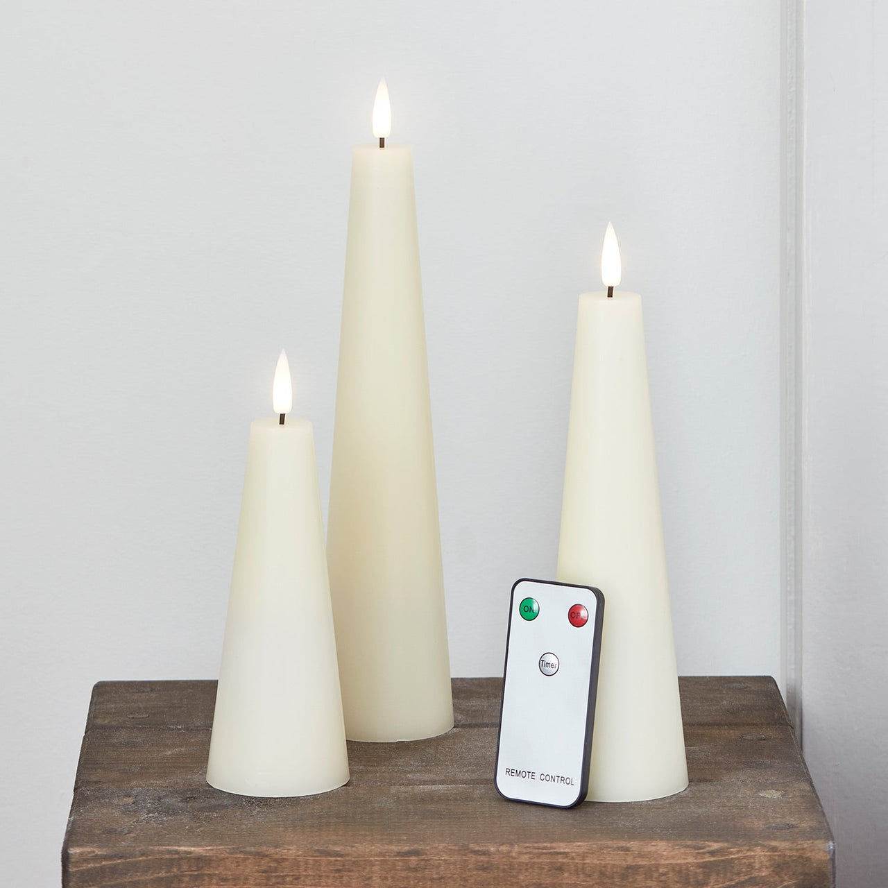 CA22018RC_Set-of-3-Ivory-Cone-TruGlow-Candles-Remote-Control_P1.jpg