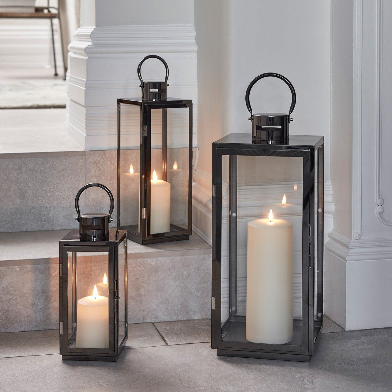 D-LA2200123_Stainless-Steel-Candle-Lantern-Trio-with-TruGlow_-Candles_2000x2000_47d86d45-46ab-4229-9213-2b0dc2003477.jpg