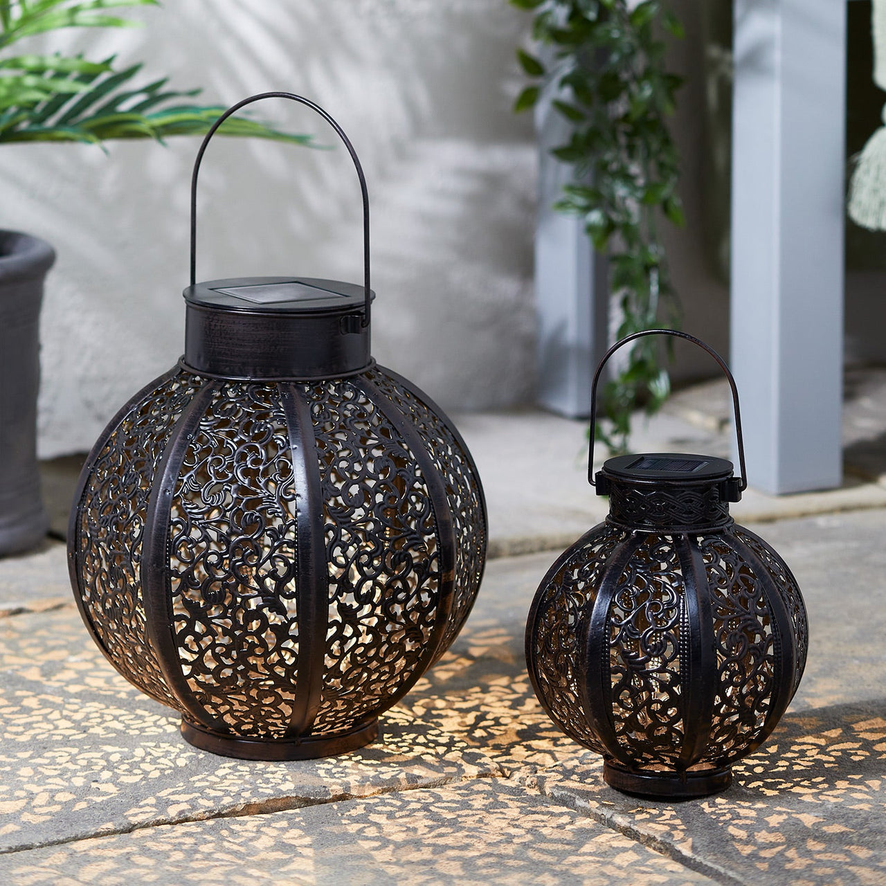 D-SL210056_Casablanca-Moroccan-Solar-Lantern-Duo-Illuminated-Patio.jpg