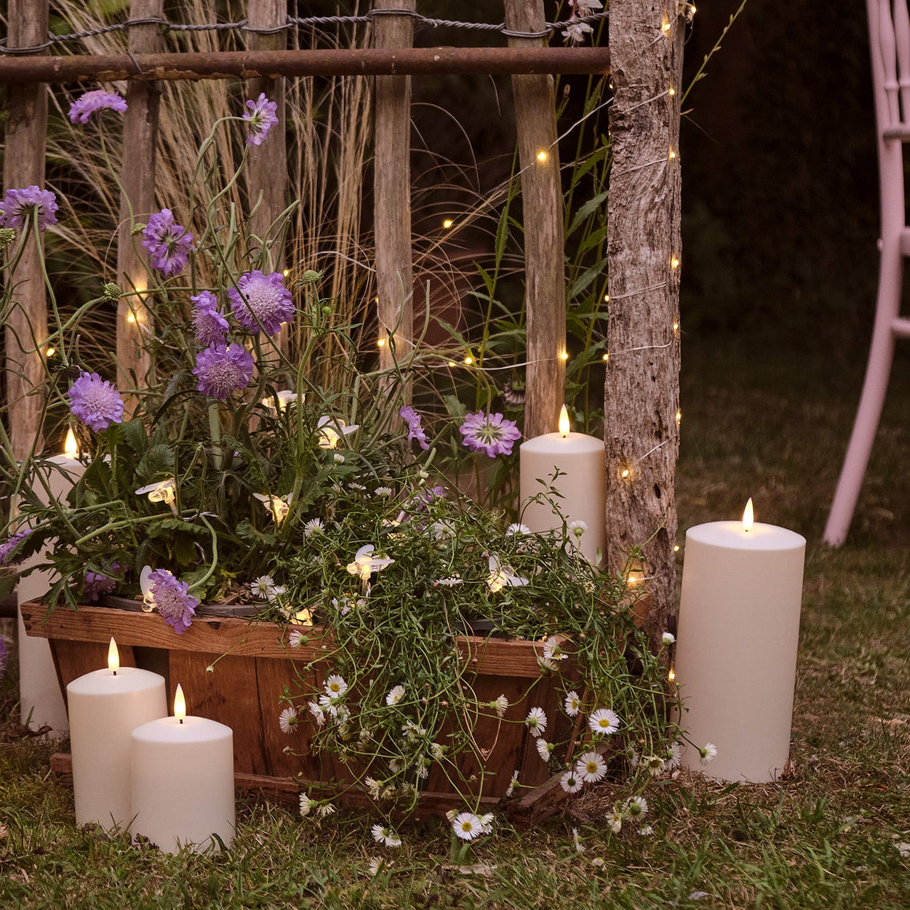 Garden--truglow-candles-fairy-lights-flowers-bees.jpg