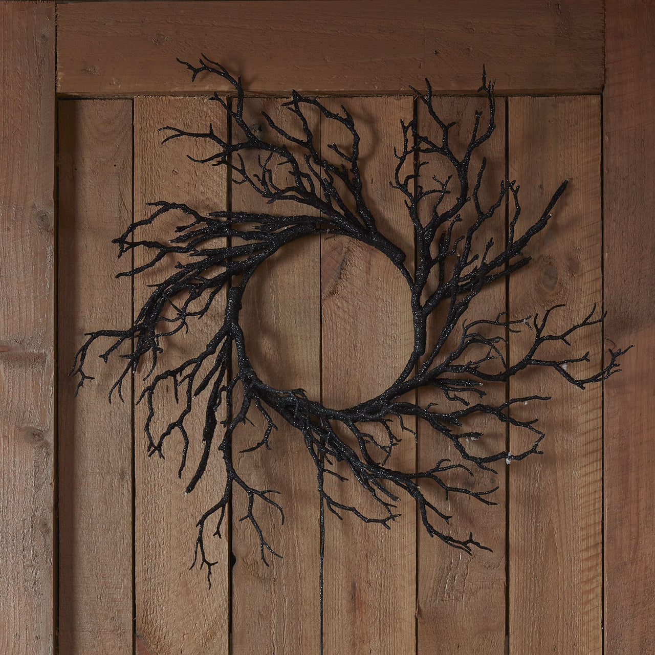 HA23002_Halloween-Prelit-Twig-Wreath-On-Wooden-Door.jpg