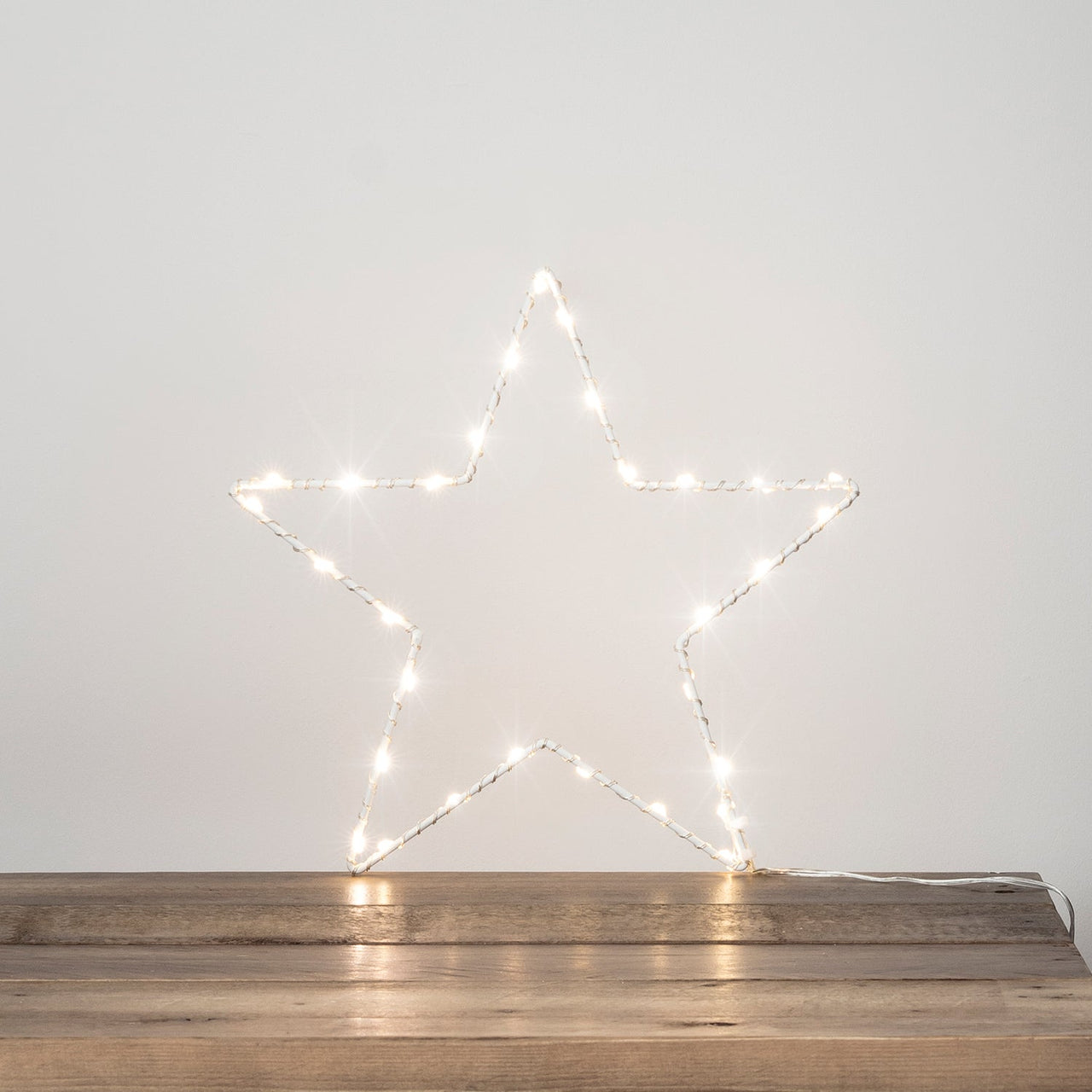 LL16003_Osby-Window-Star-Light-Bedroom-Bedside-Table-Close_P1.jpg