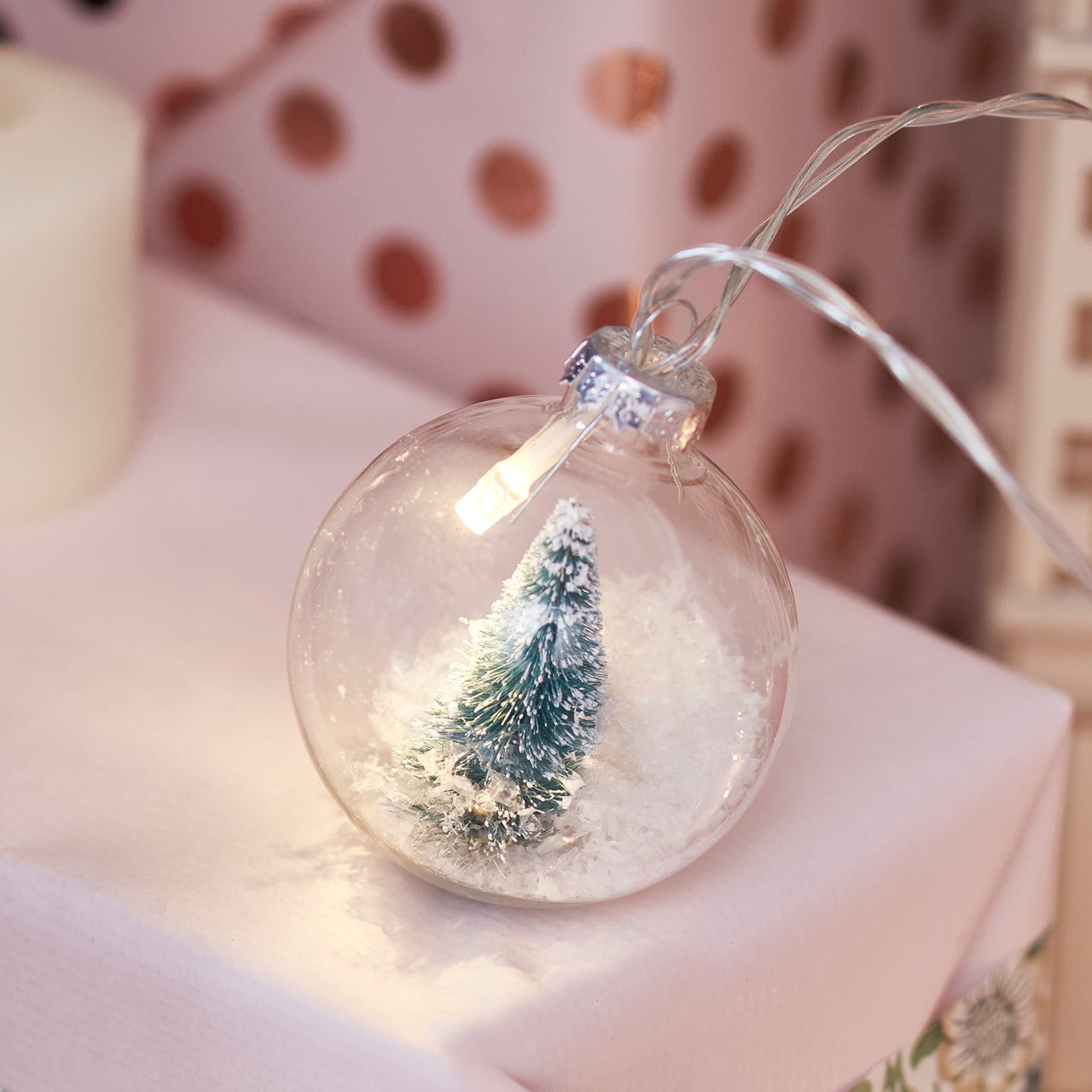 LL21089_Snowy-Globe-Christmas-Tree-Fairy-Lights-Illuminated-Close.jpg