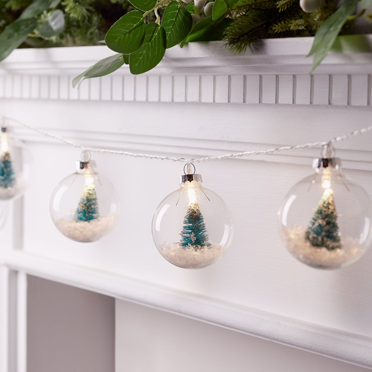 LL21089_Snowy-Globe-Christmas-Tree-Fairy-Lights-Mantel-Illuminated.jpg