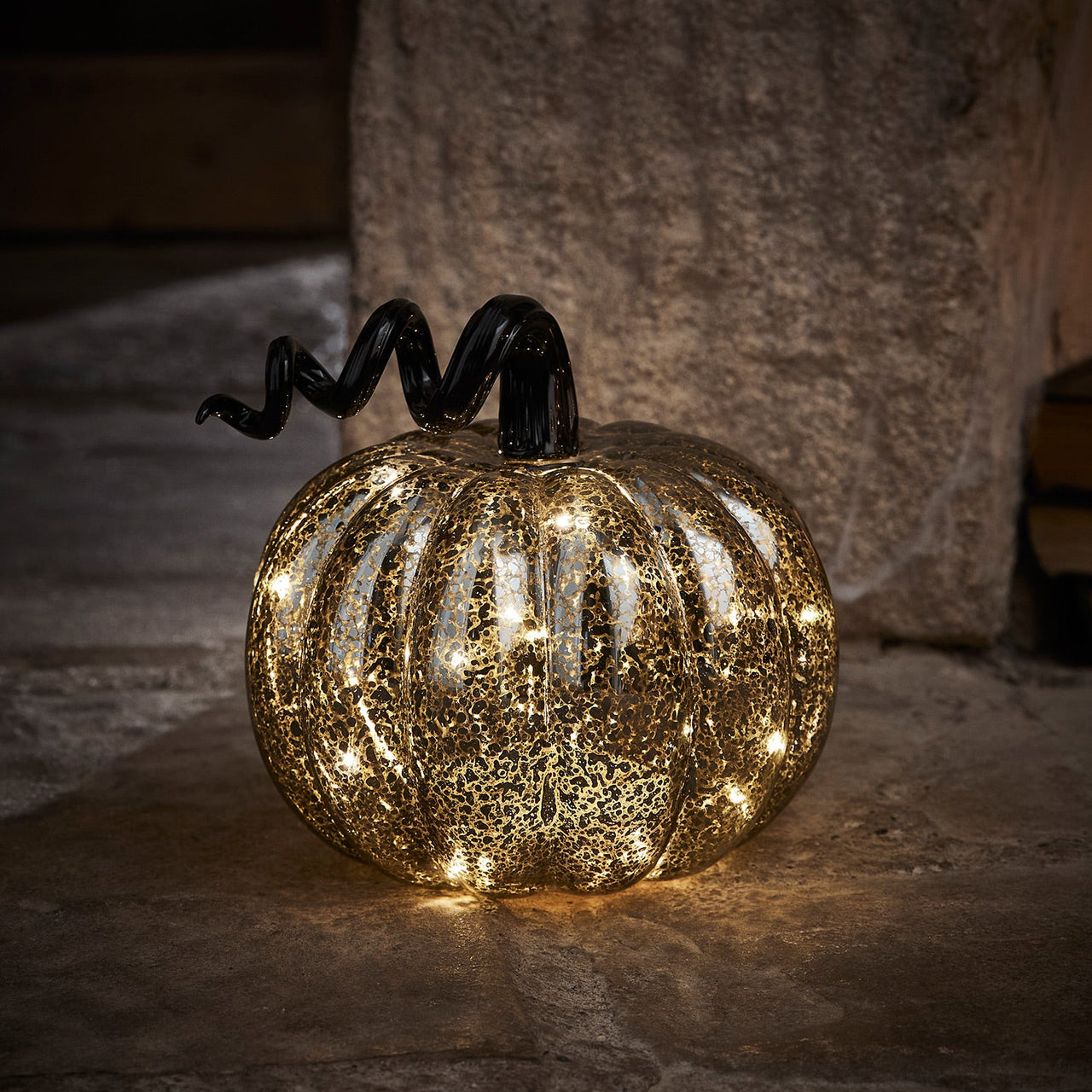 LL22063_Mercury-Black-Light-Up-Pumpkin-Decoration-On.jpg