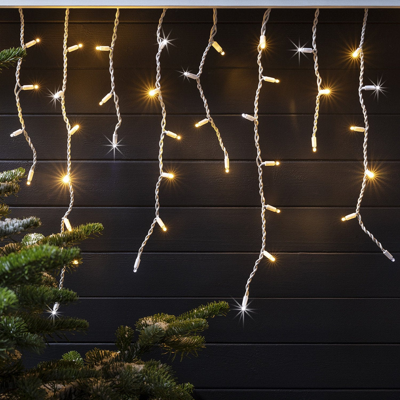 PR100YWWS_100-Sparkling-Warm-White-LED-Icicle-Lights-Close_P1_97cdb166-ce43-4d02-a17e-85e475770d27.jpg