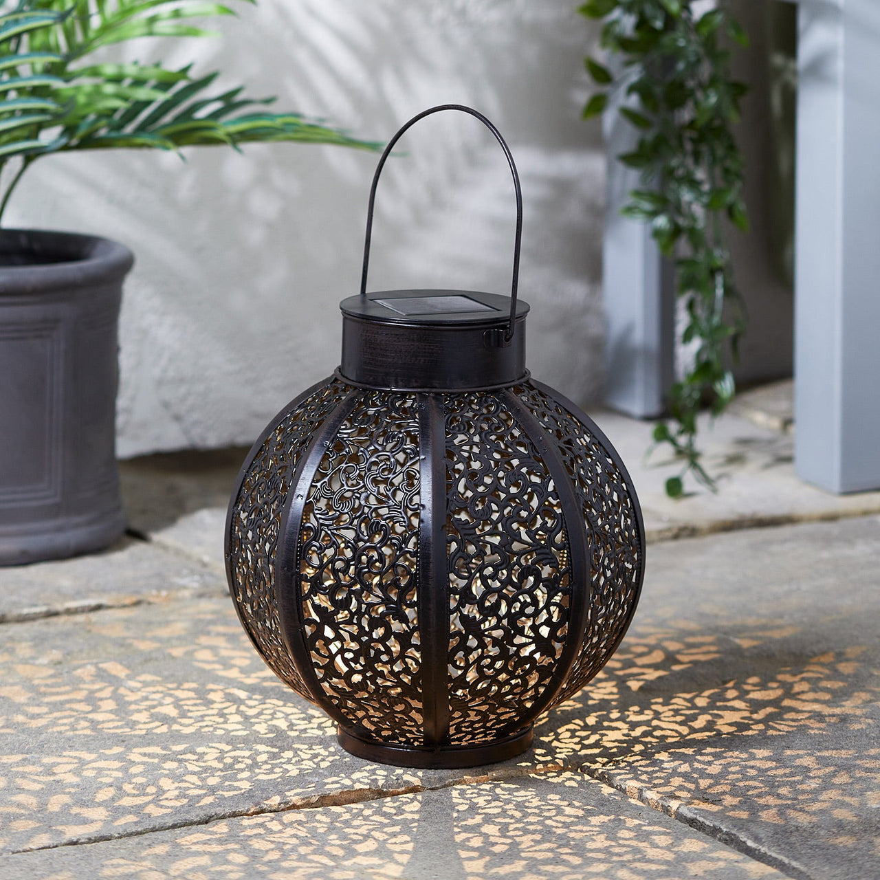 SL21005_Large-Casablanca-Moroccan-Solar-Lantern-Illuminated-Patio-Day.jpg