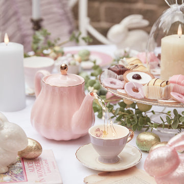 Tea-party-garland-teapot-bunnies-floral-led-candles.jpg