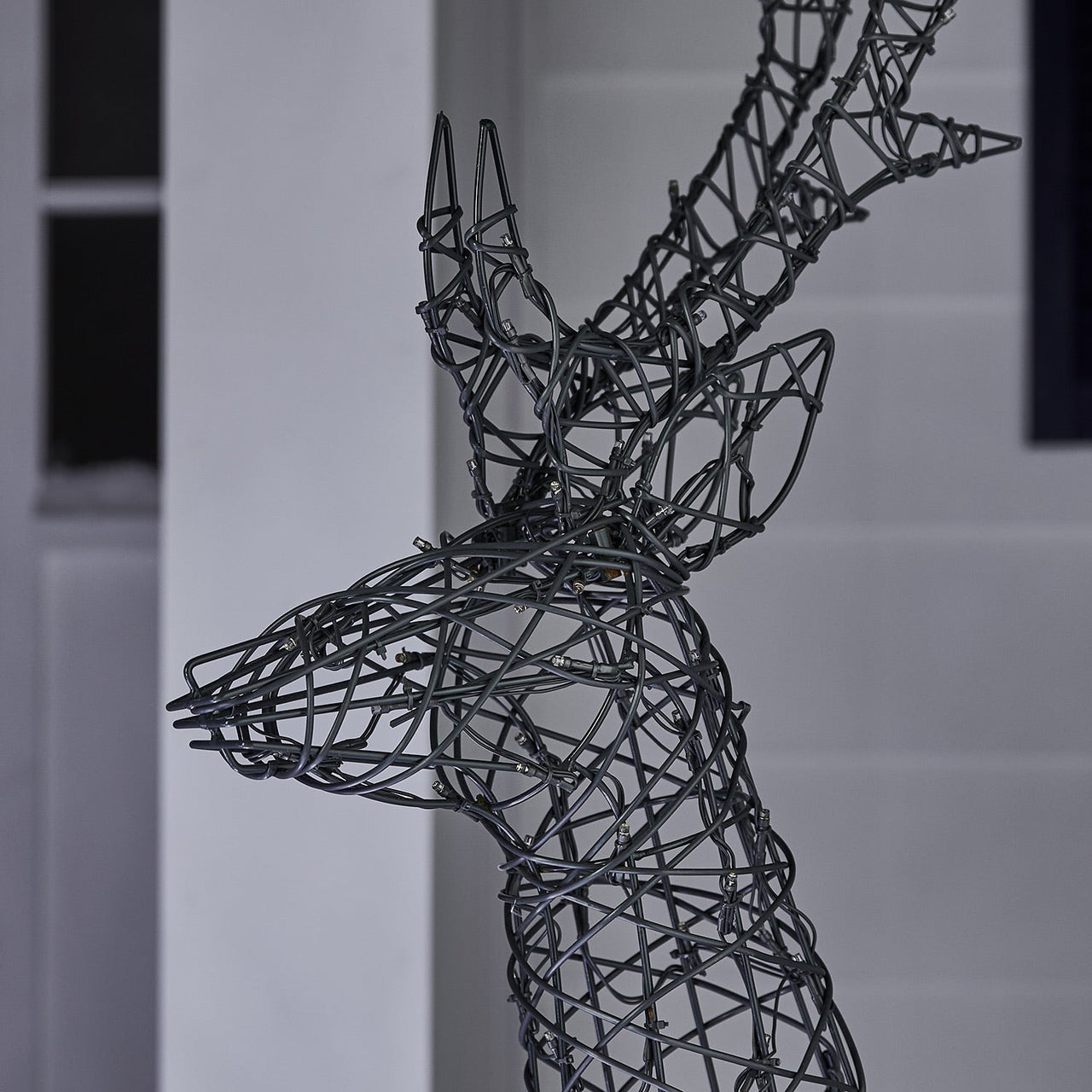 XX2102_Harlow-Rattan-Stag-Light-Up-Reindeer-Close-Off_7e5485da-1065-4765-8742-63fa8f1988b1.jpg