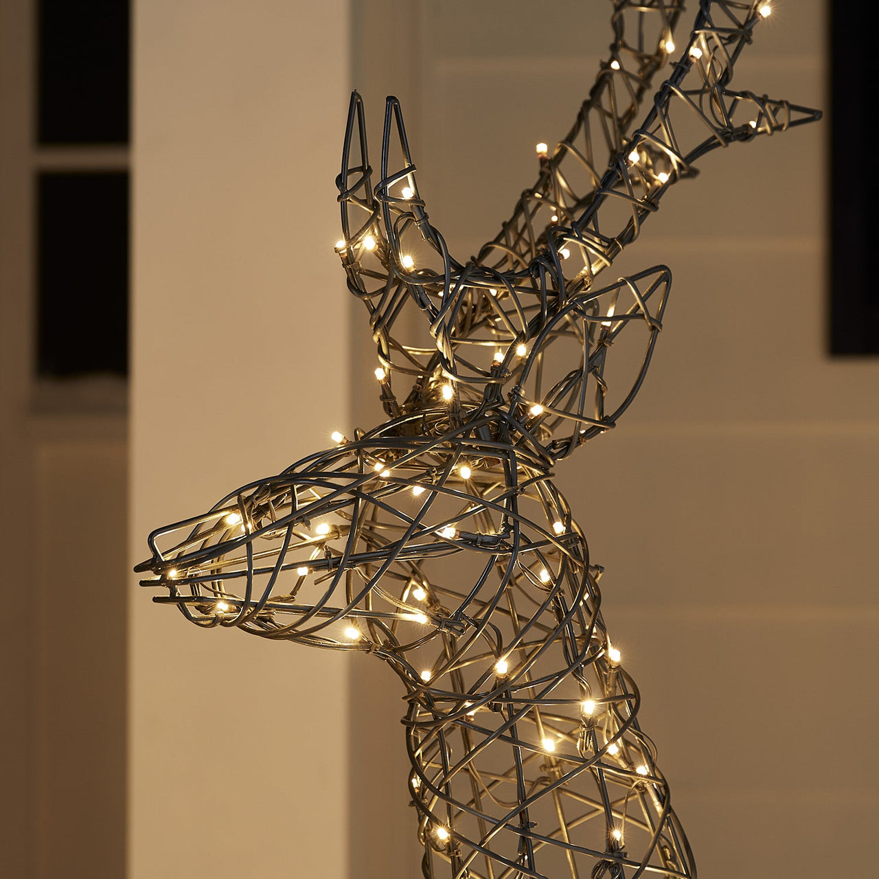 XX2102_Harlow-Rattan-Stag-Light-Up-Reindeer-Close-Warm-White.jpg